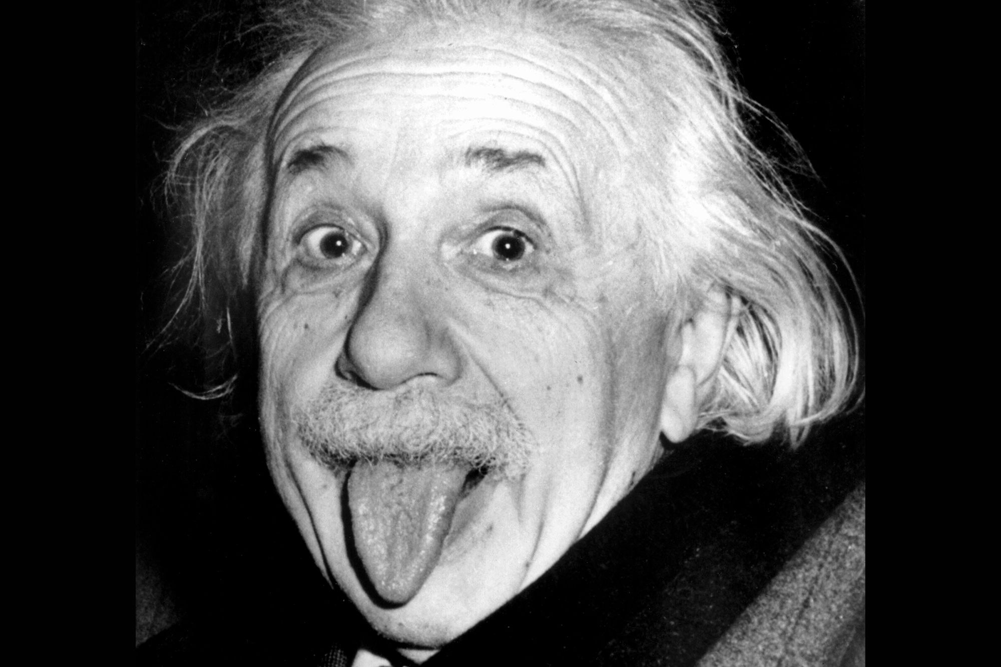 Albert Einstein sticking out his tongue.